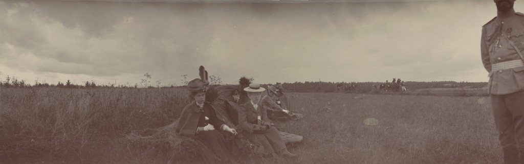 Grand Duchess Xenia Alexandrovna, Empress Alexandra Feodorovna and Grand Duke Alexander Mikhailovich Seated in a Field, Ropsha