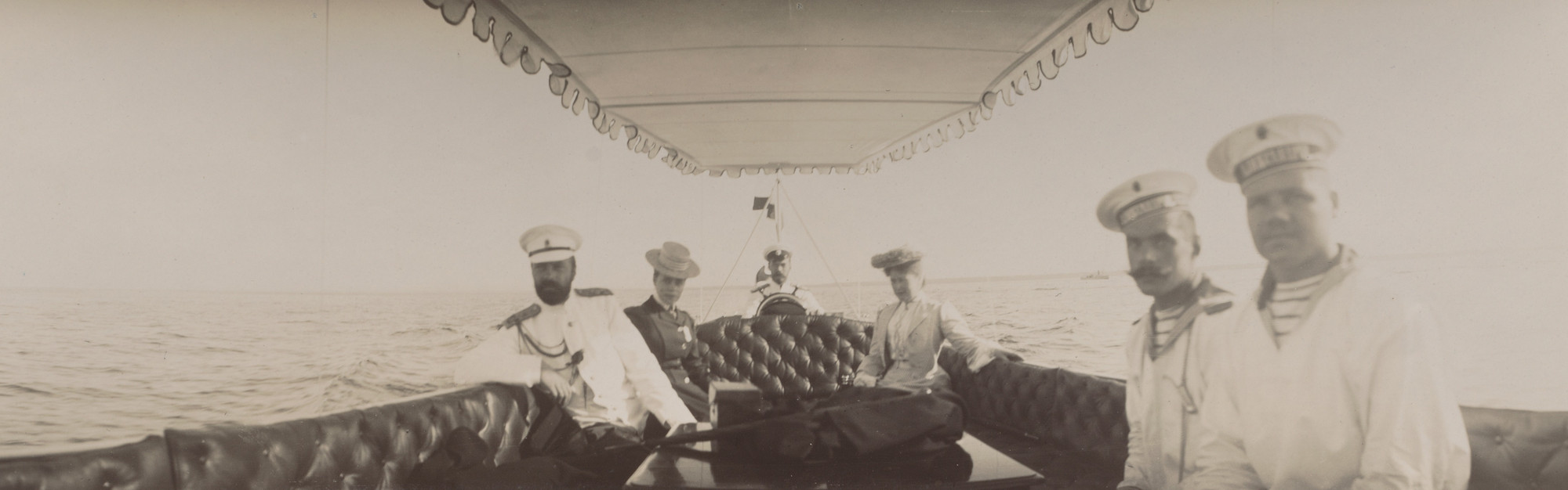 Unidentified photographer. Grand Duke Alexander Mikhailovich, Grand Duchess Xenia Alexandrovna, Emperor Nicholas II and Empress Alexandra Feodorovna on the Zarnitsa, Peterhof
