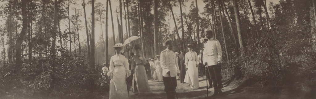 Emperor Nicholas II, Empress Alexandra Feodorovna with an Umbrella and Grand Duchess Olga Alexandrovna on a Walk Through the Woods in Sarov