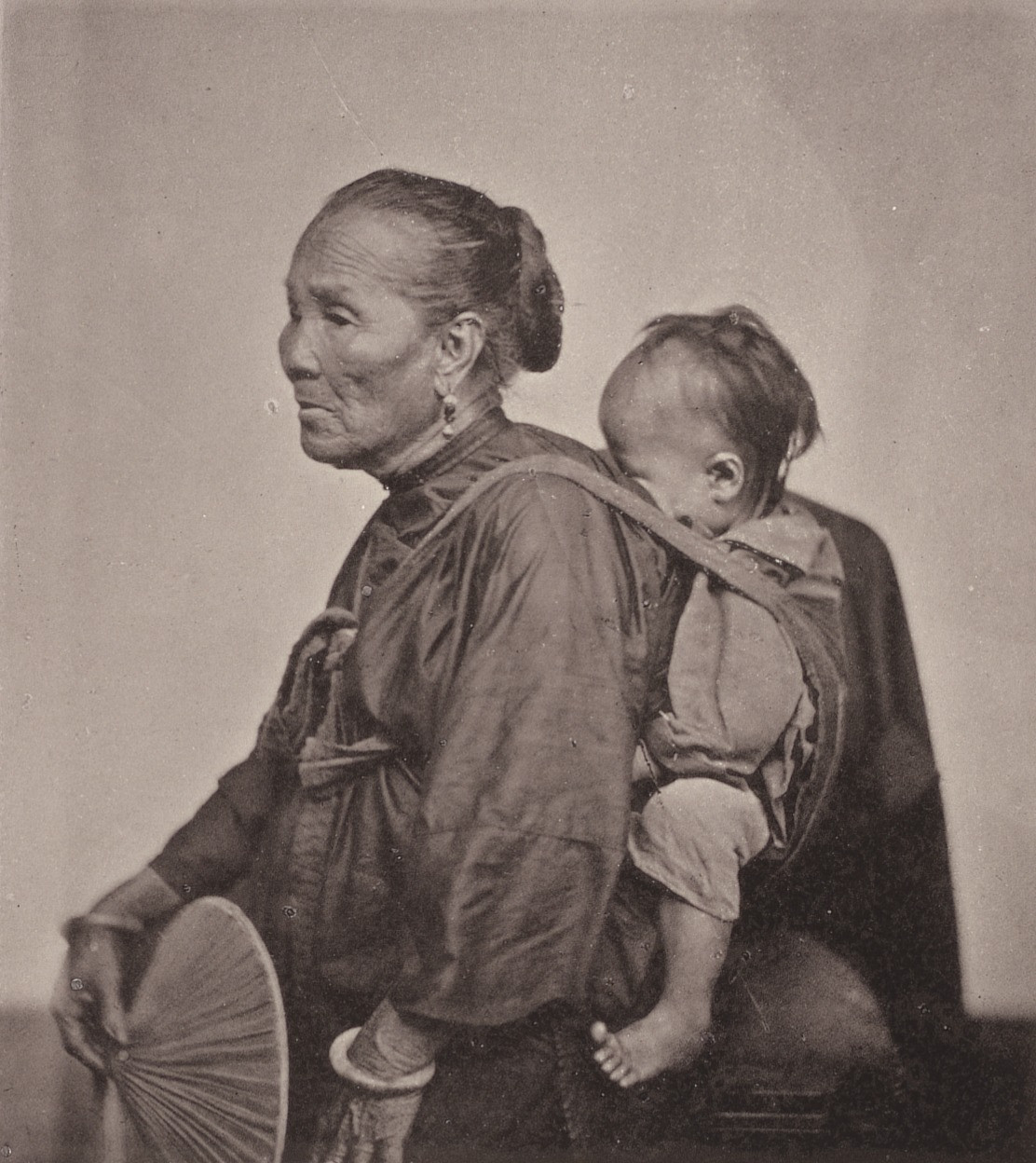 John Thomson. A Canton Boatwoman and Child
