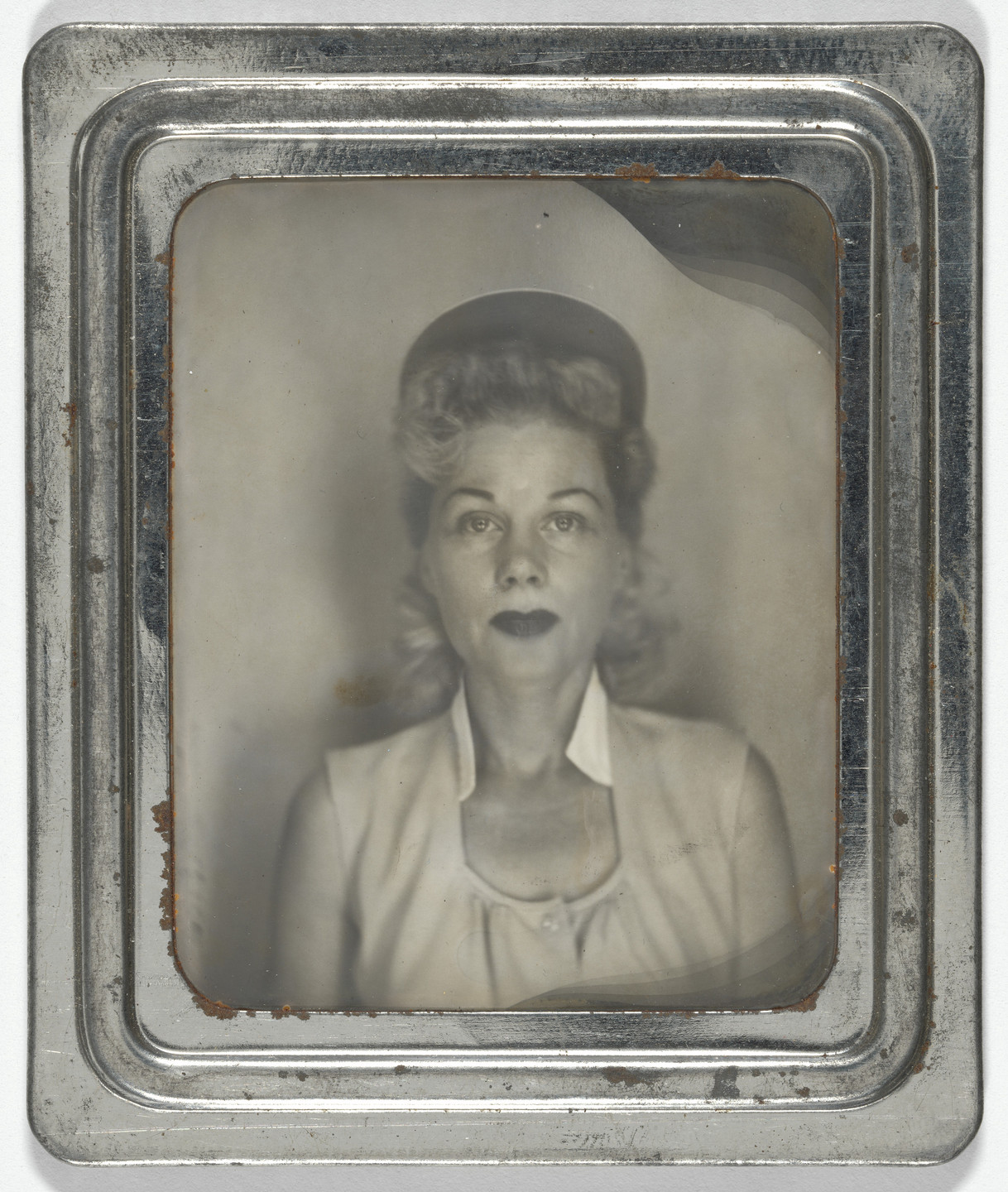 Unidentified photographer. Photobooth self-portraits. 1940s
