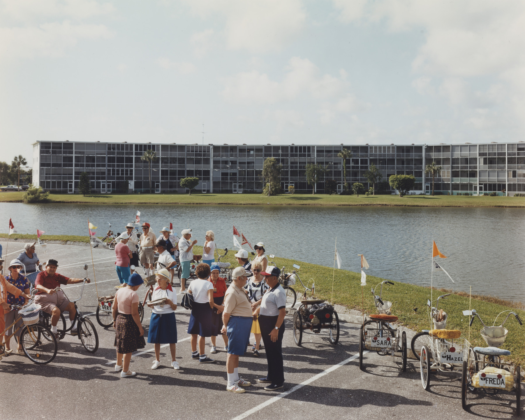 Joel Sternfeld. Bike 'n' Trike club, Century Village, West Palm Beach, Florida. April 1983