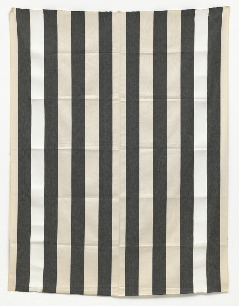 Black and white striped fabric. External white bands covered over with white paint, recto-verso