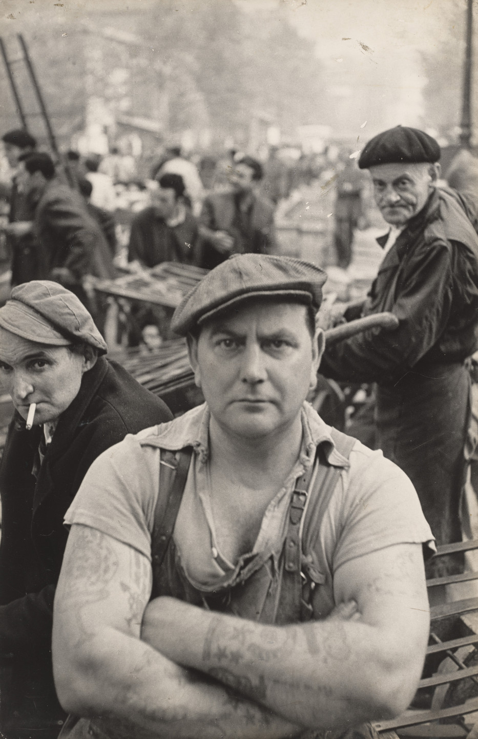 Henri Cartier-Bresson. Boucher, Les Halles de Paris. 1952