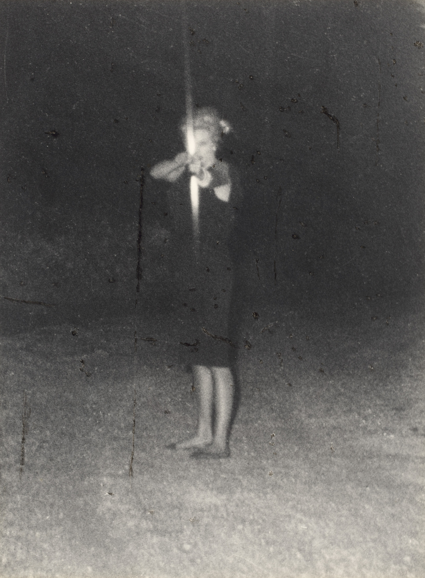 Marcello Geppetti. Anita Ekberg surrounded by Paparazzi defends herself with bow and arrow
