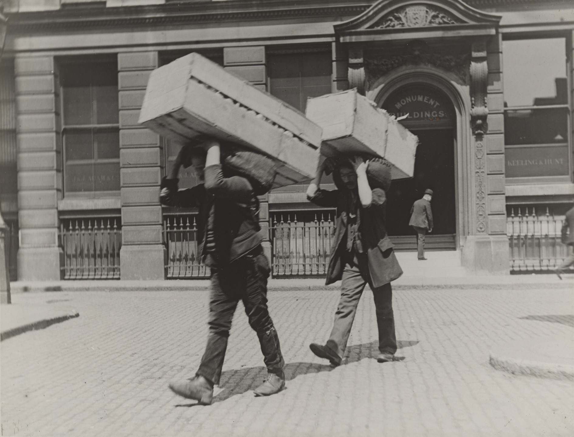 Paul Martin. Market Porters Carrying Boxes of Oranges. 1894