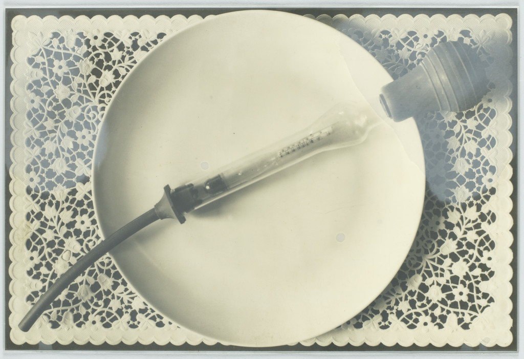 Syringe on plate placemat