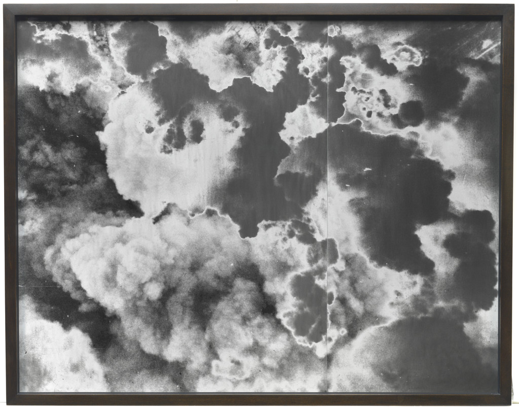 A Handley Page Halifax of No. 4 Group flies over the suburbs of Caen, France, during a major daylight raid to assist the Normandy land battle. 467 aircraft took part in the attack, which was originally intended to have bombed German strongpoints north of, Caen, but the bombing area was eventually shifted nearer the city because of the proximity of Allied troops to the original targets. The resulting bombing devastated the northern suburbs, 1944/2012