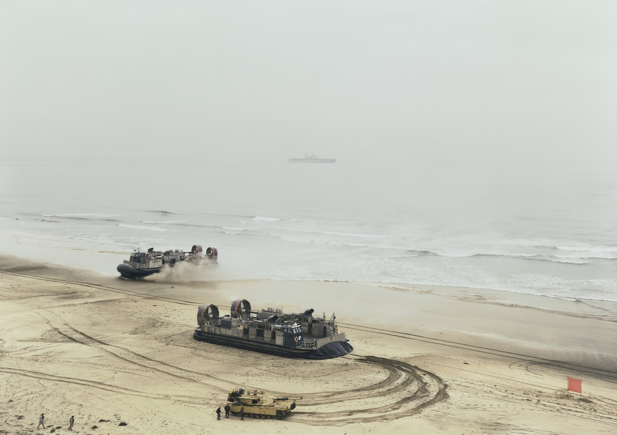 An-My Lê. Offload, LCACs and Tank, California. 2006