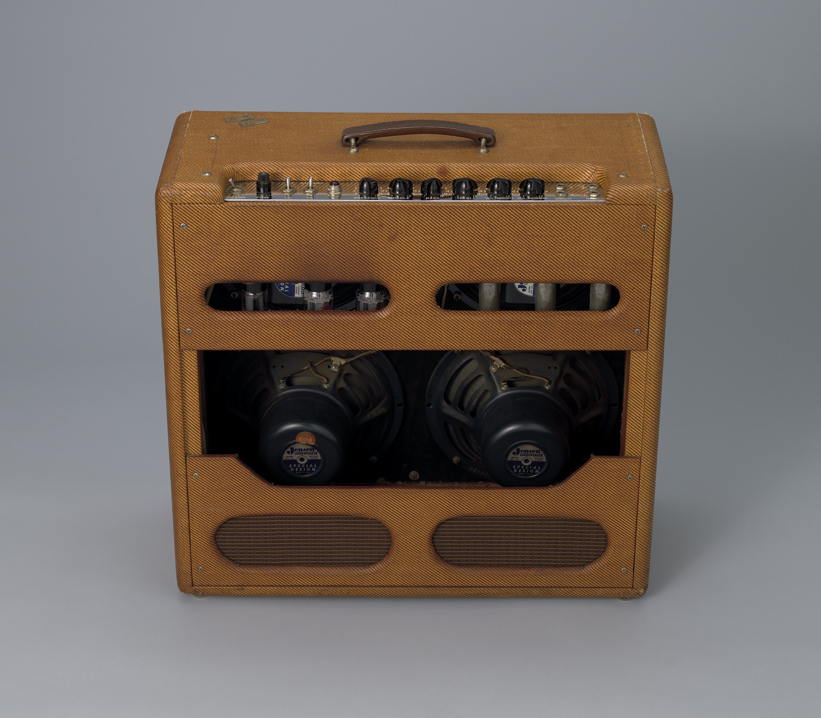 Leo Fender, George Fullerton, Freddie Tavares. Fender Bassman speaker. 1959