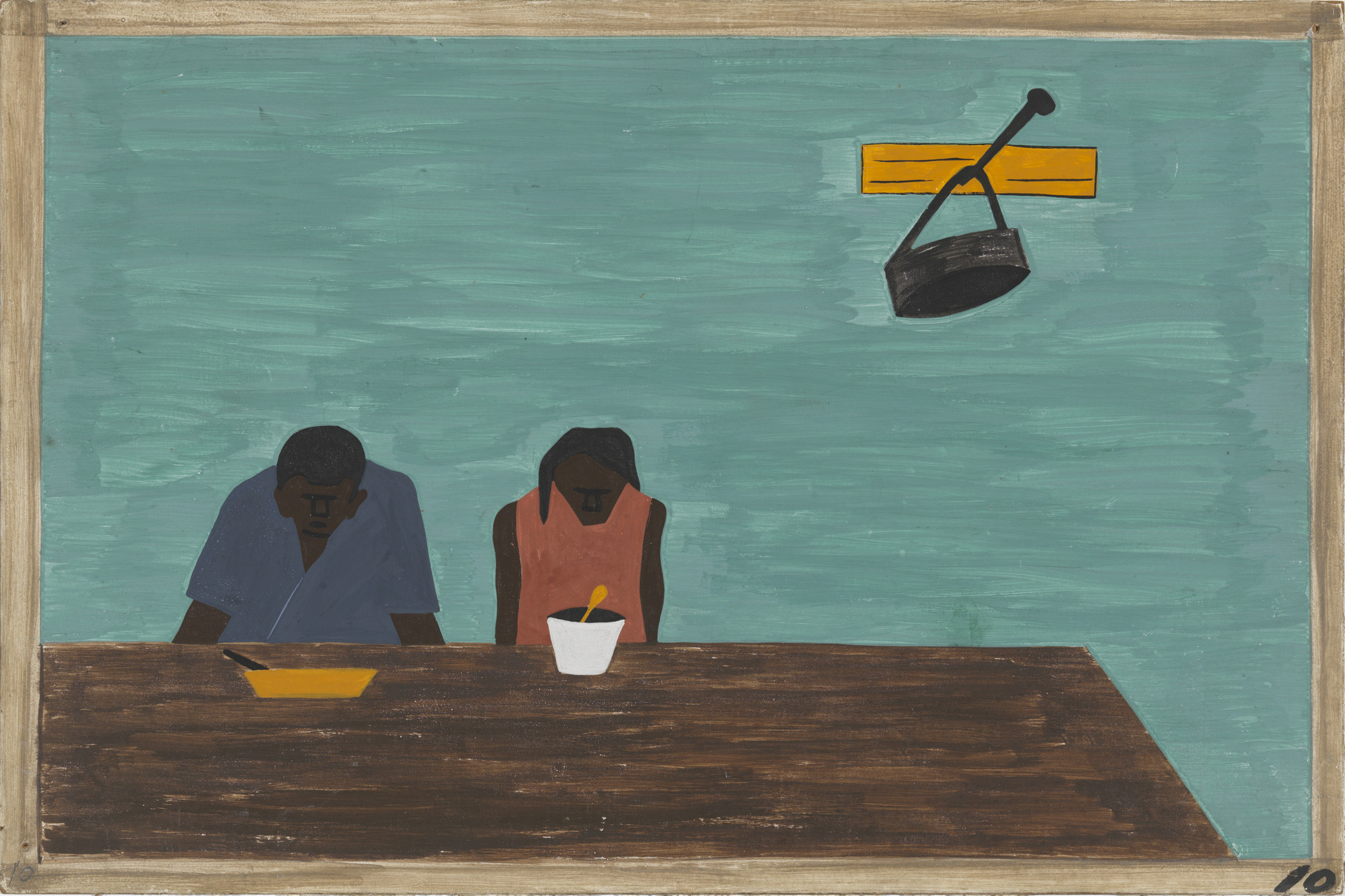 Two people sitting at a brown table with bowls in front of them against a teal wall. A black pot hangs on a yellow wall hook above them. This is an AI generated description. To give feedback, email ai@moma.org.