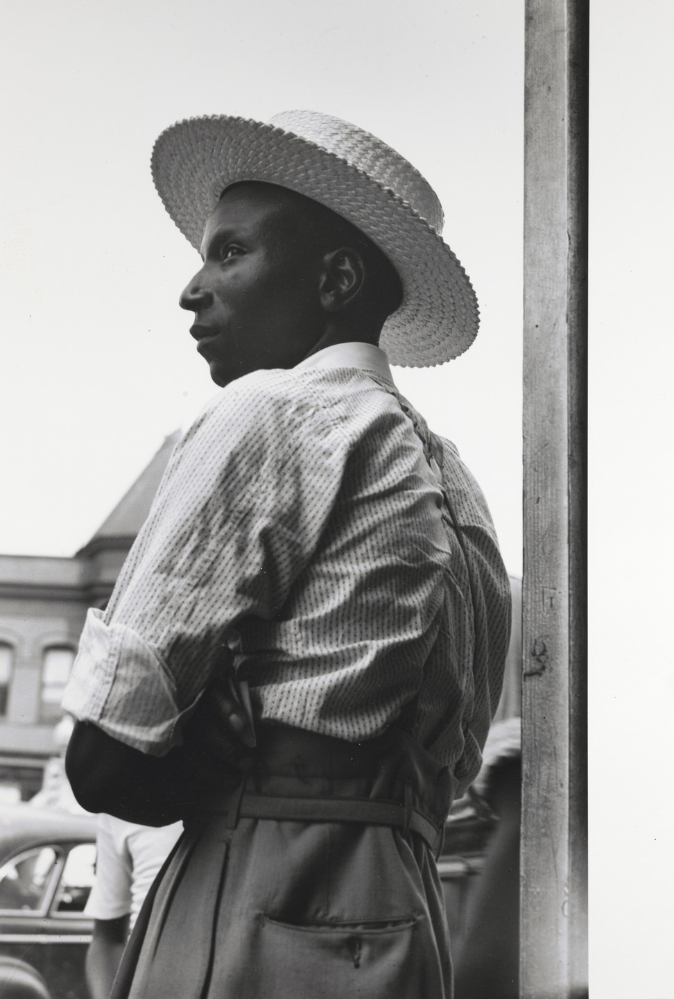 Gordon Parks. Man with Straw Hat, Washington, D.C.. 1942