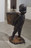 Kara Walker. African Boy Attendant Curio with Molasses and Brown Sugar, from "The Marvelous Sugar Baby" Installation at the old Domino Sugar Factory Warehouse. (Rear Basket),. 2014
