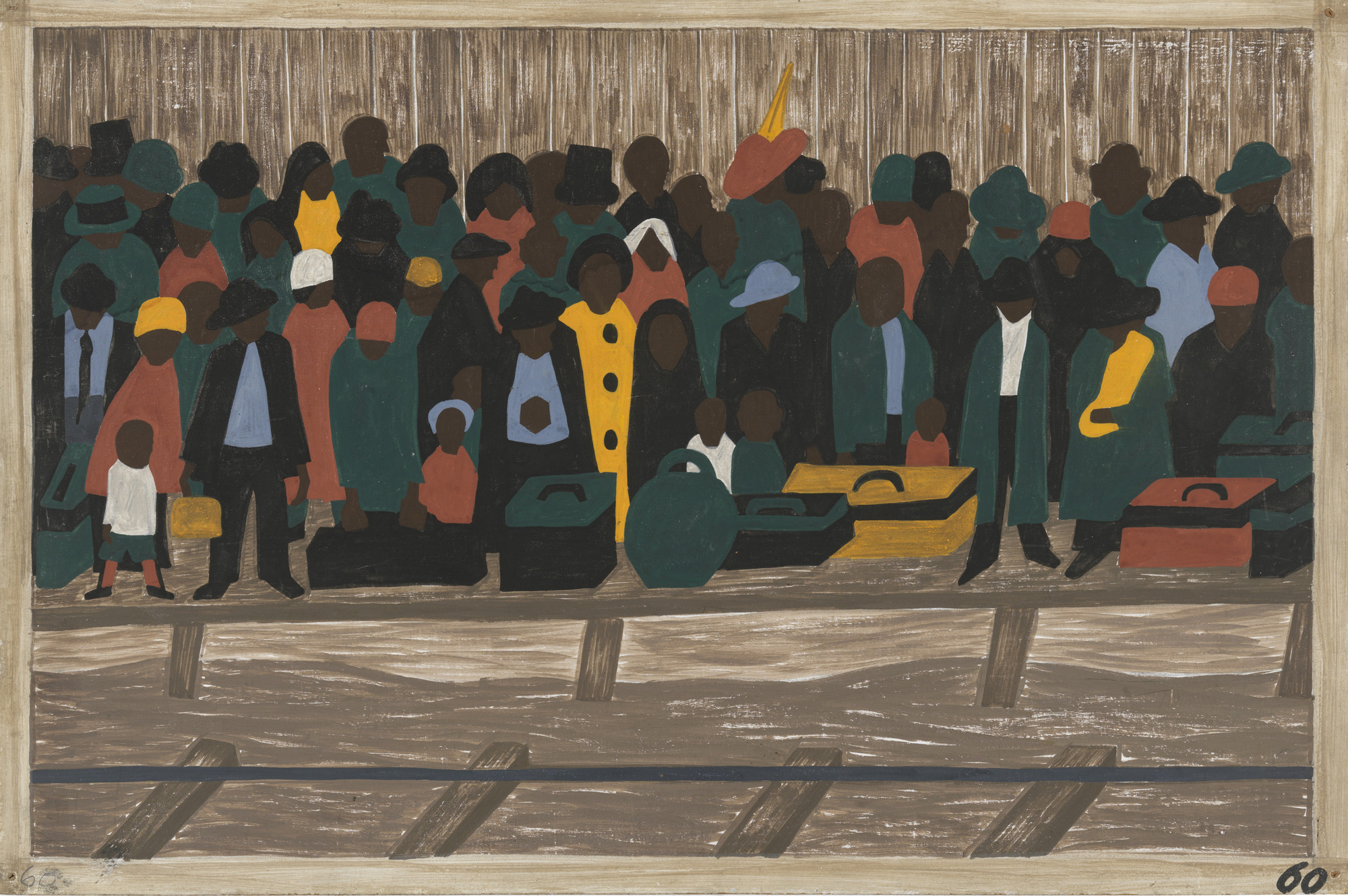 A large group of people, dressed in dark green, black, red, and yellow clothing, standing on a wooden platform, beside multiple suitcases. The background is a wooden fence. This is an AI generated description. To give feedback, email ai@moma.org.