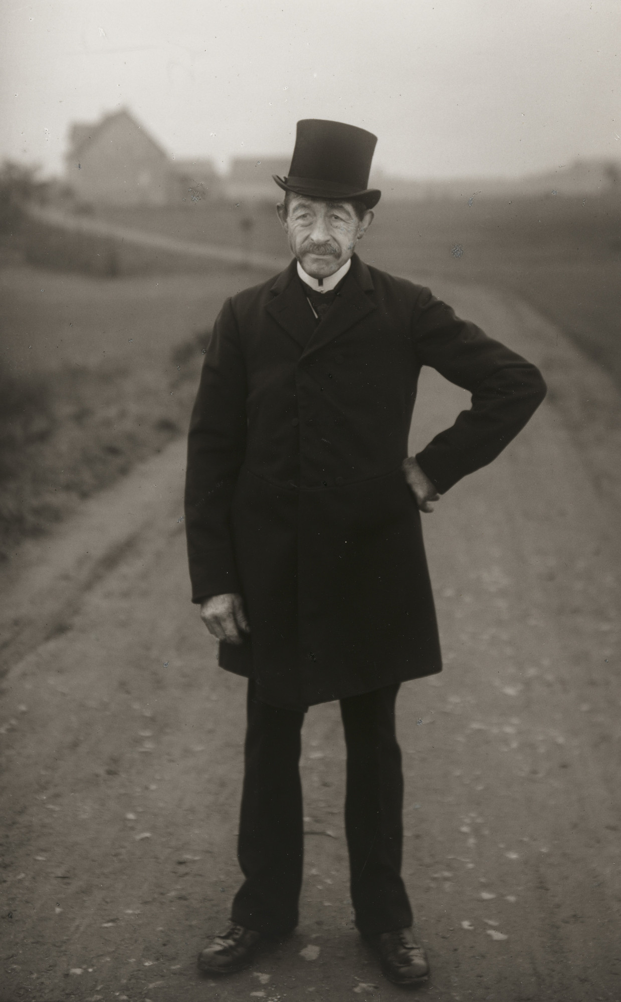 August Sander. Farmer on his Way to Church