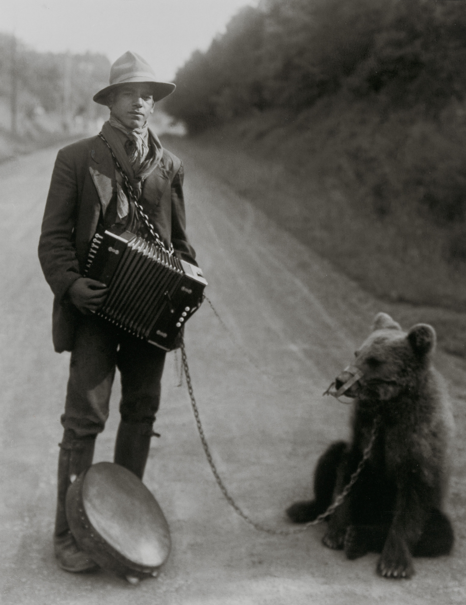 August Sander. Showman with Performing Bear in the Westerwald