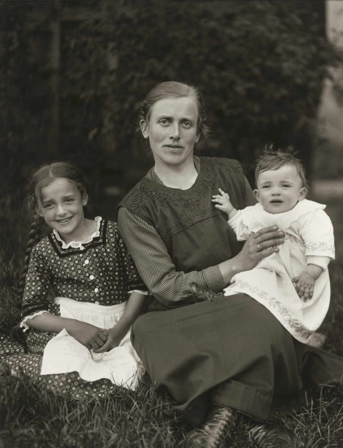August Sander. Farm Woman and her Children. 1920-25