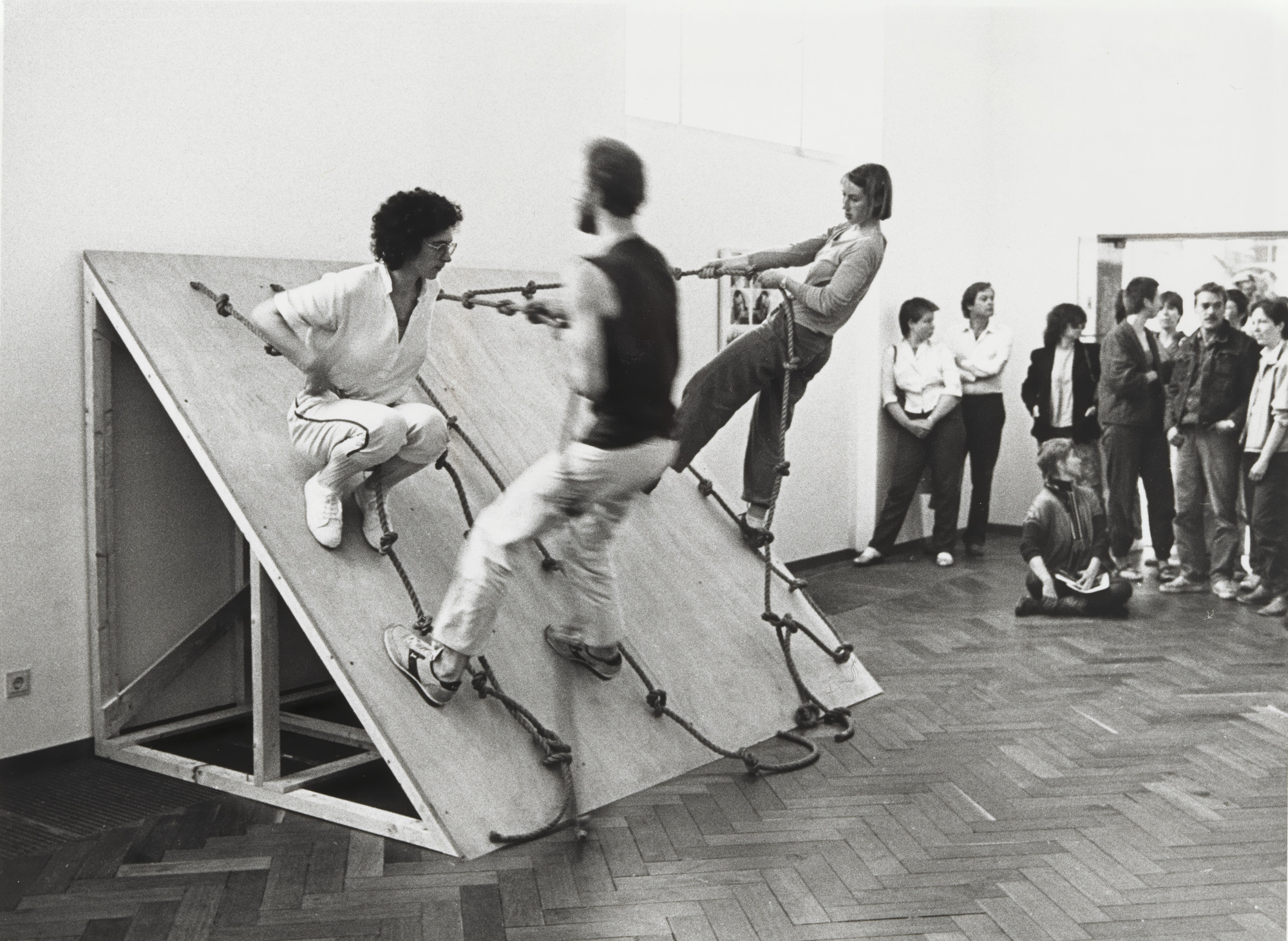 Simone Forti. Photograph of "Slant Board Performance" at the Stedelijk Museum
