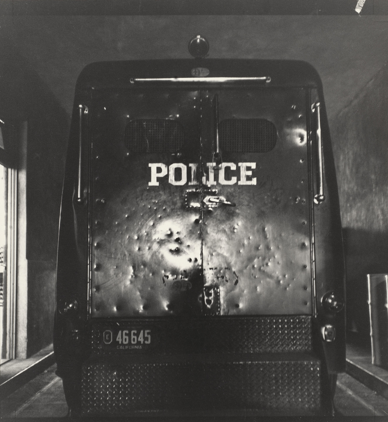 Dorothea Lange. Black Maria, Oakland. 1955-57