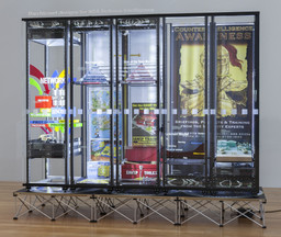 Simon Denny. Modded Server-Rack Display with Some Interpretations of David Darchicourt Designs for NSA Defense Intelligence. 2015