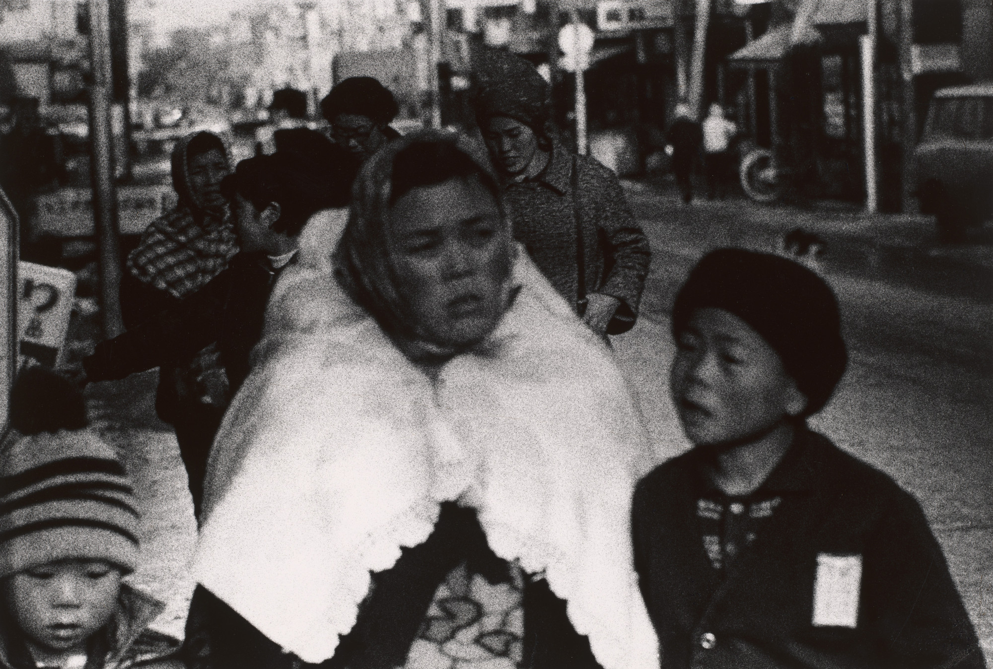 Daidō Moriyama (森山 大道). Mother and Her Children in Winter, Misawa. 1971