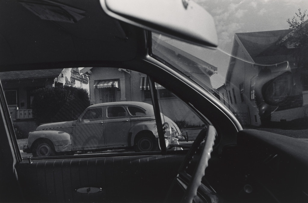 San Francisco, California, (view of car, house with awning taken through window)