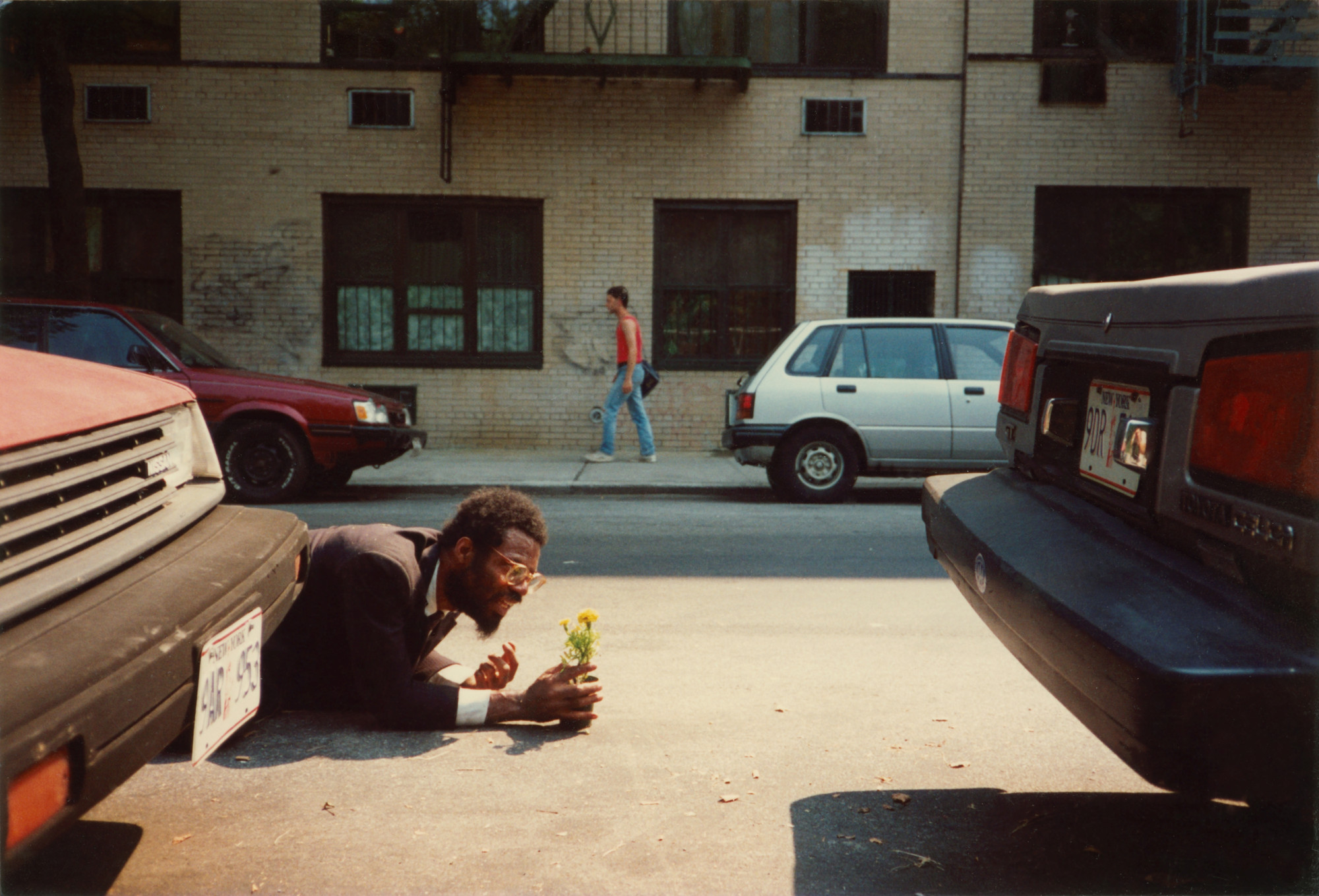 Pope.L. How Much is that Nigger in the Window a.k.a. Tompkins Square Crawl. 1991