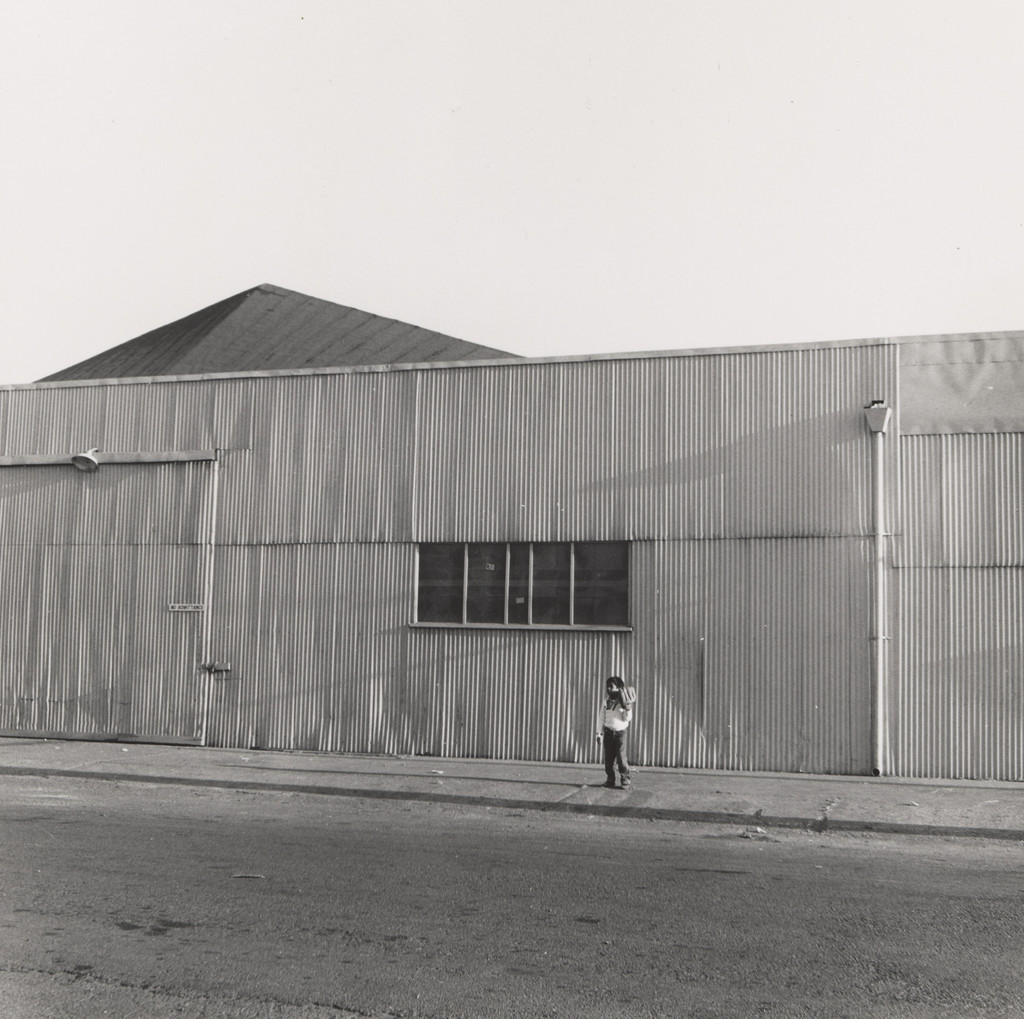 Warehouse and Child with Baseball Mitt, West Oakland, CA