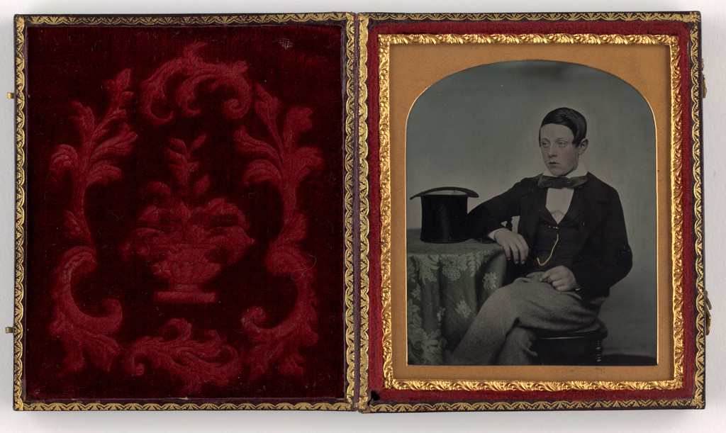 Portrait of Young Man Seated