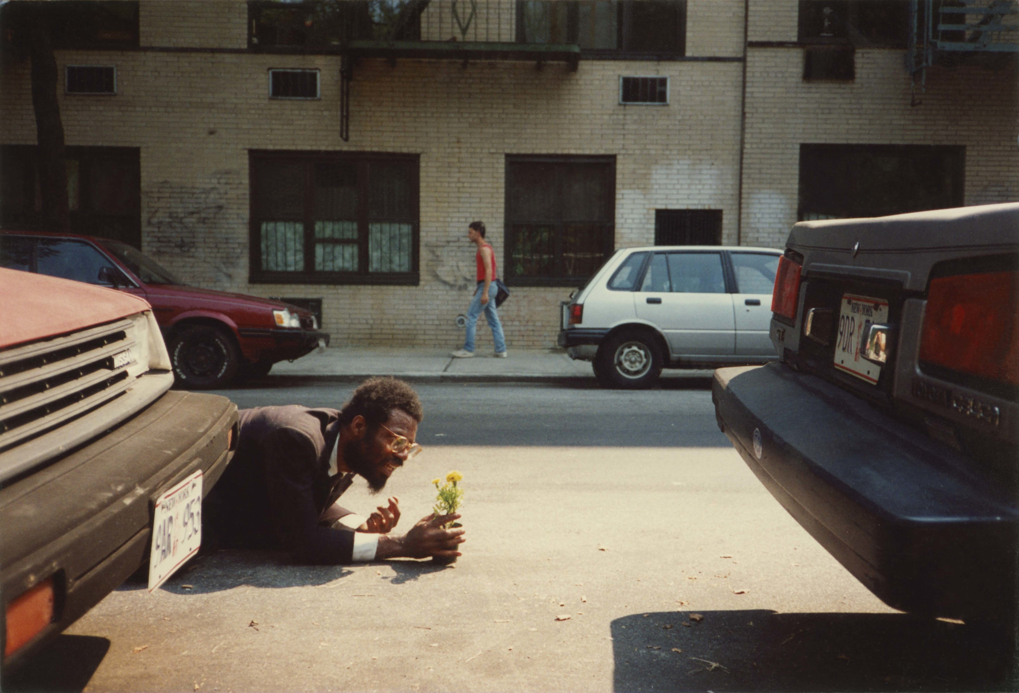 Pope.L. How Much is that Nigger in the Window a.k.a. Tompkins Square Crawl. 1991