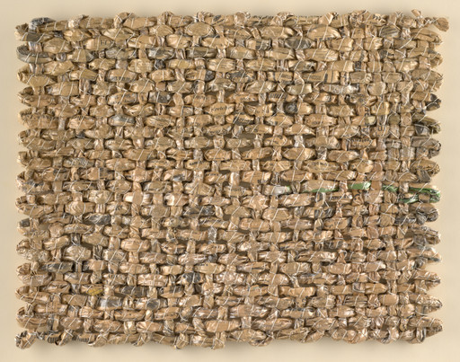 Construction with Newspaper and Plastic Wall Hanging