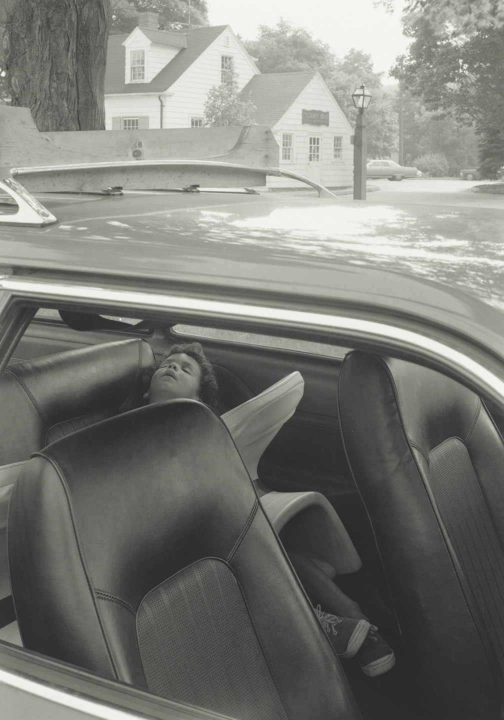 Richard Benson. Untitled (child in back seat of car). c. 1990