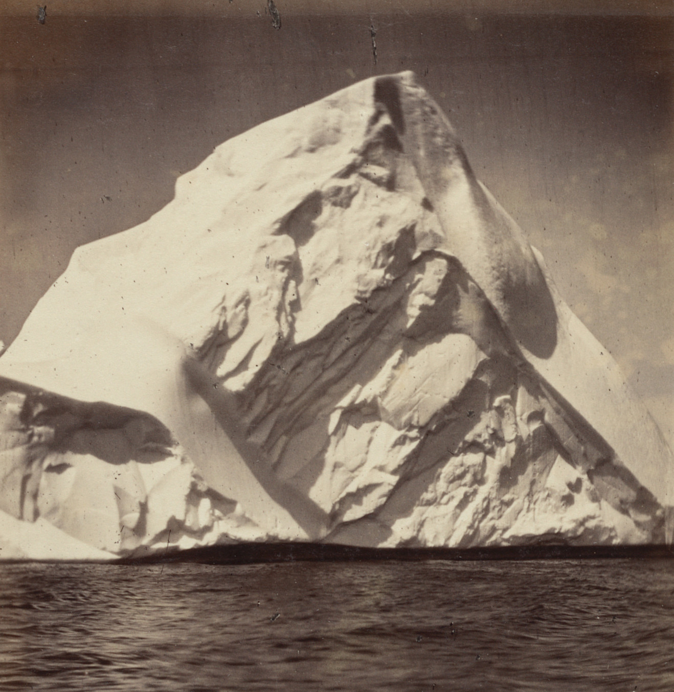 George P. Critcherson, John L. Dunmore, William Bradford. "Iceberg grounded near the land"