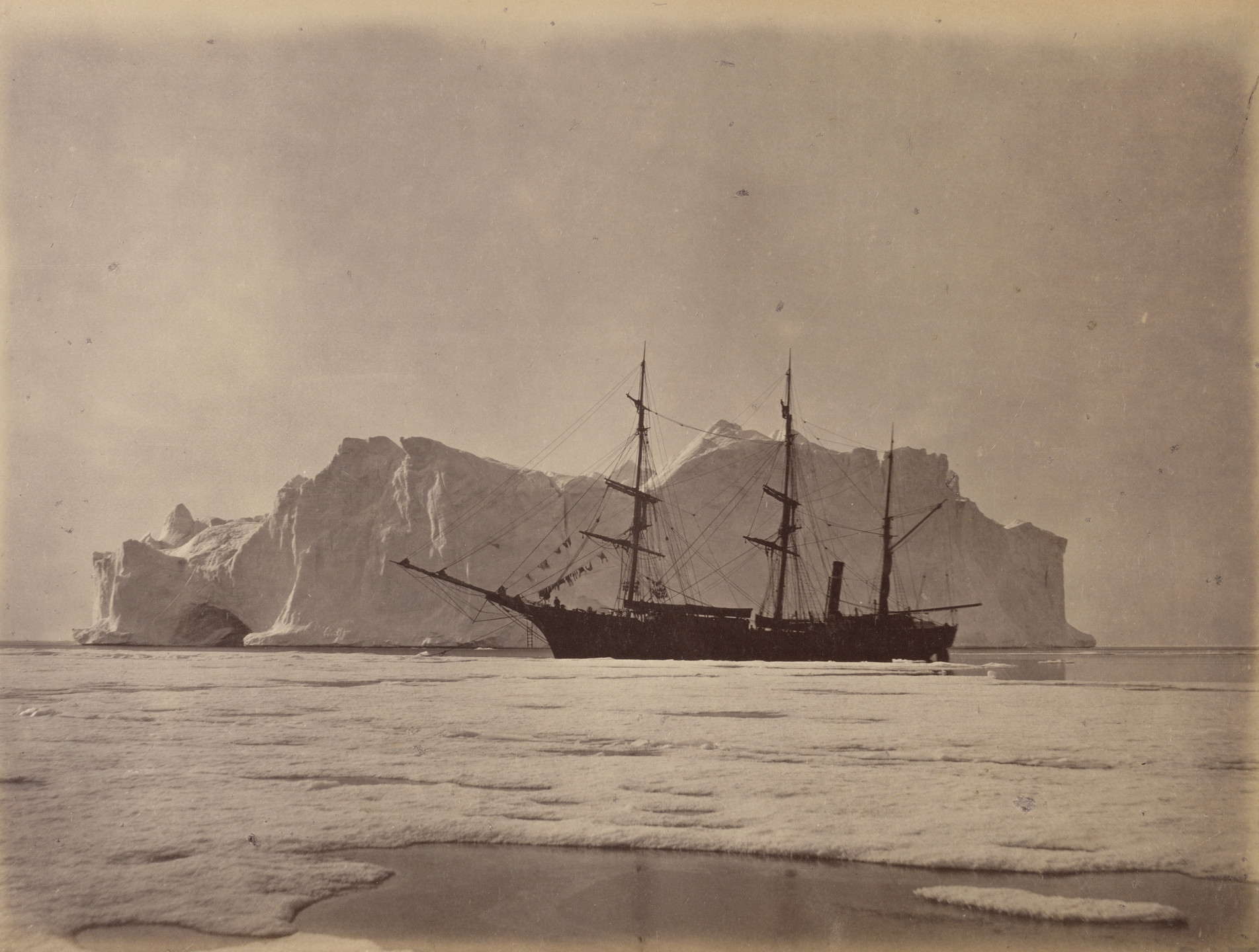 George P. Critcherson, John L. Dunmore, William Bradford. "The steamer, in an open lead, moored to the edge of the ice field". 1869