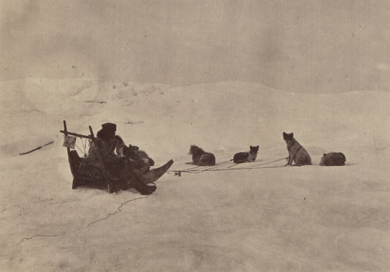 George P. Critcherson, John L. Dunmore, William Bradford. "Jansen with his Comettick, or sledge, and dog team". 1869