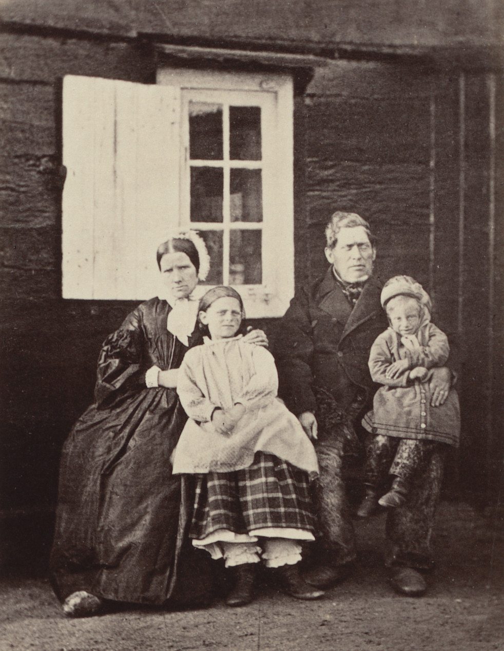 George P. Critcherson, John L. Dunmore, William Bradford. "Dr. Rudolph, his wife, and children"