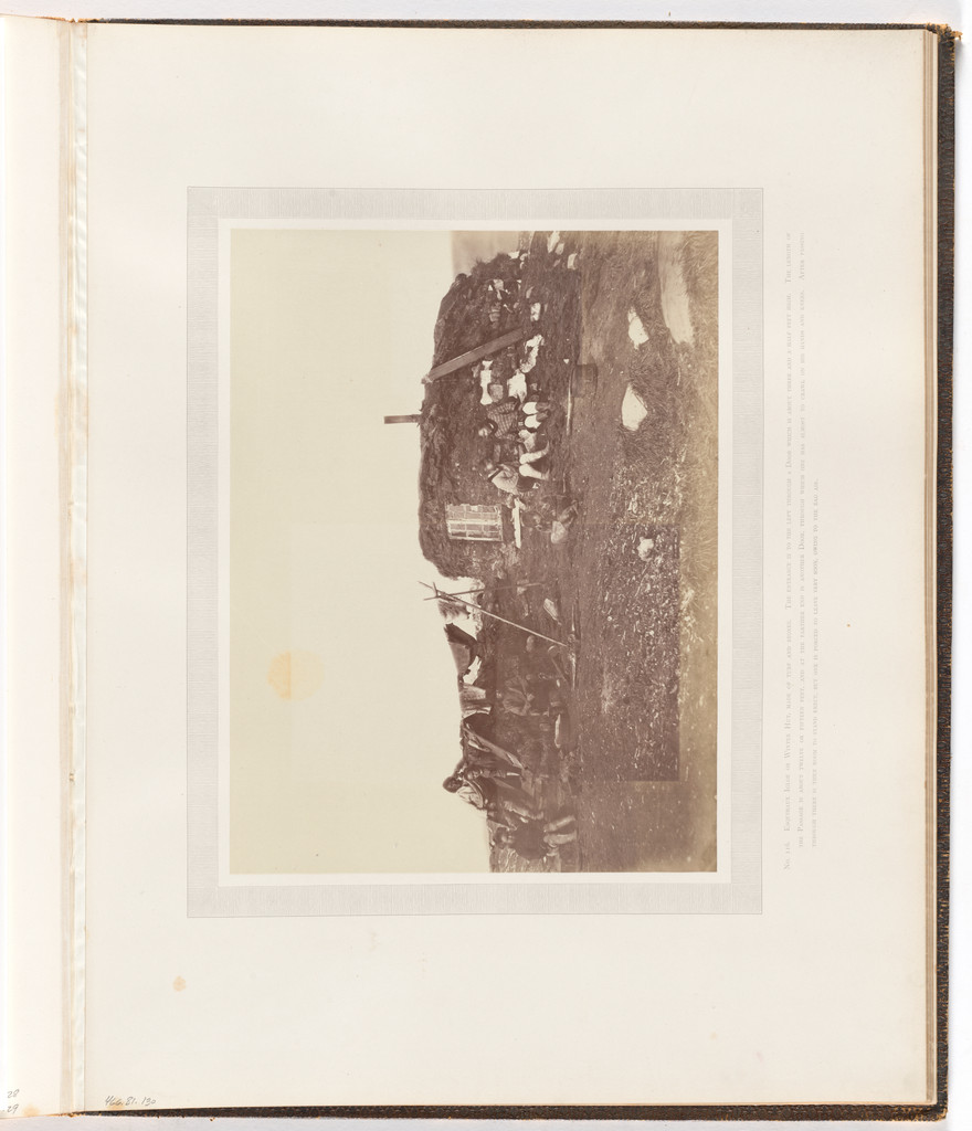 "Esquimaux igloe or winter hut, made of turf and stones"