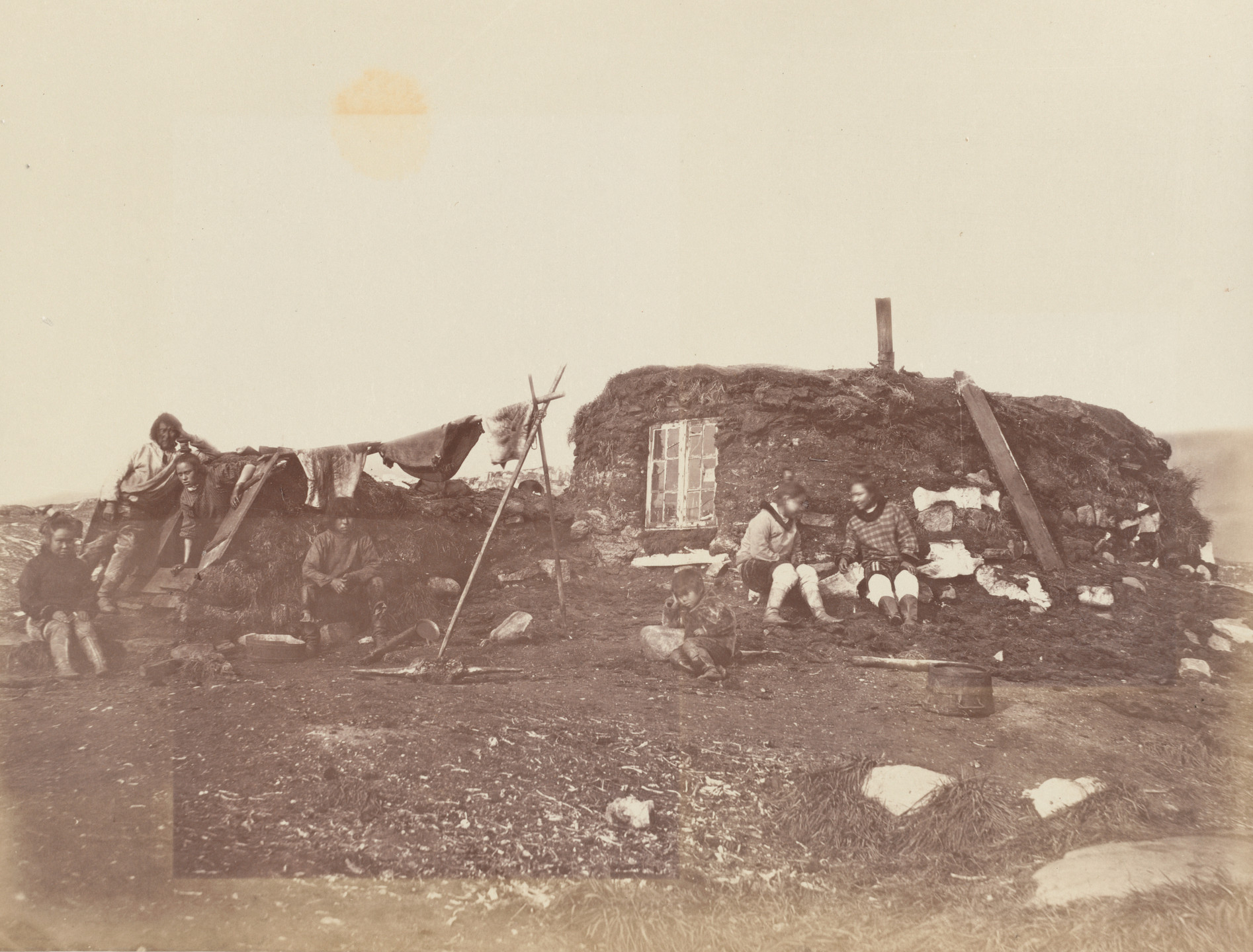 George P. Critcherson, John L. Dunmore, William Bradford. "Esquimaux igloe or winter hut, made of turf and stones". 1869