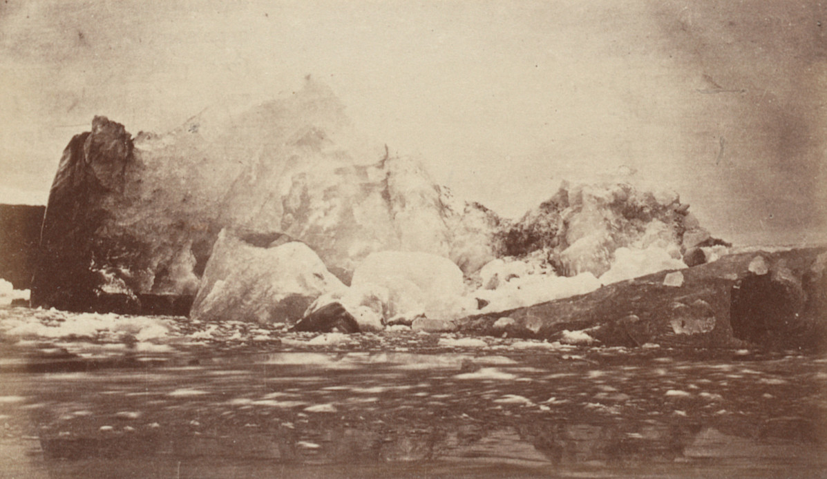 George P. Critcherson, John L. Dunmore, William Bradford. "One of the eight immense icebergs, which were discharged from the front of the 
Glacier within five minutes"