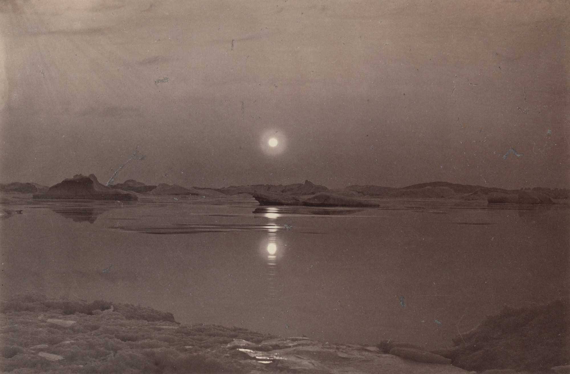 George P. Critcherson, John L. Dunmore, William Bradford. "The midnight sun in Melville Bay in August"