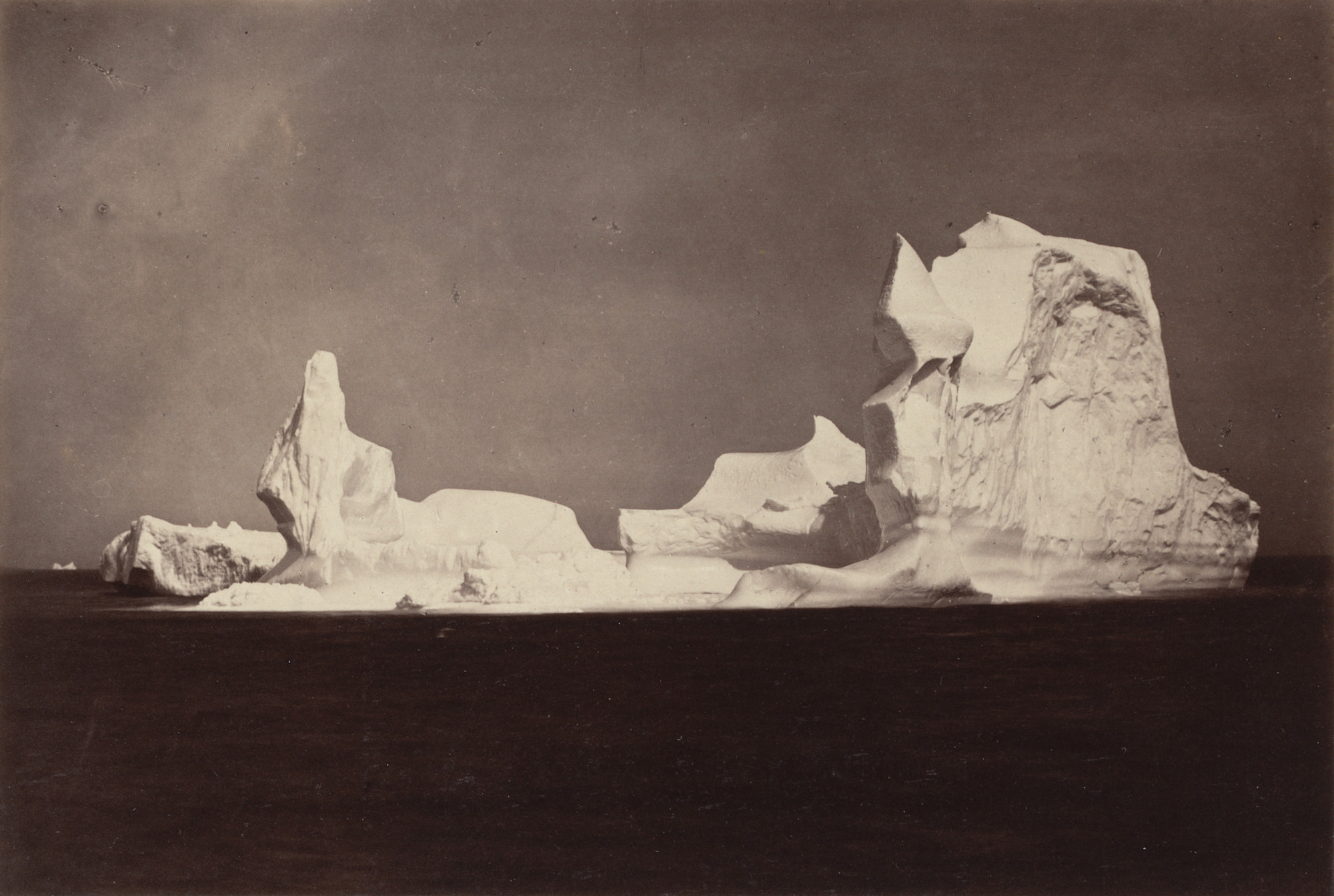 George P. Critcherson, John L. Dunmore, William Bradford. "This View shows the beautiful forms in varied shapes which the Berg assumed. On this Berg we found a Lake of Fresh Water, covering an acre in extent."