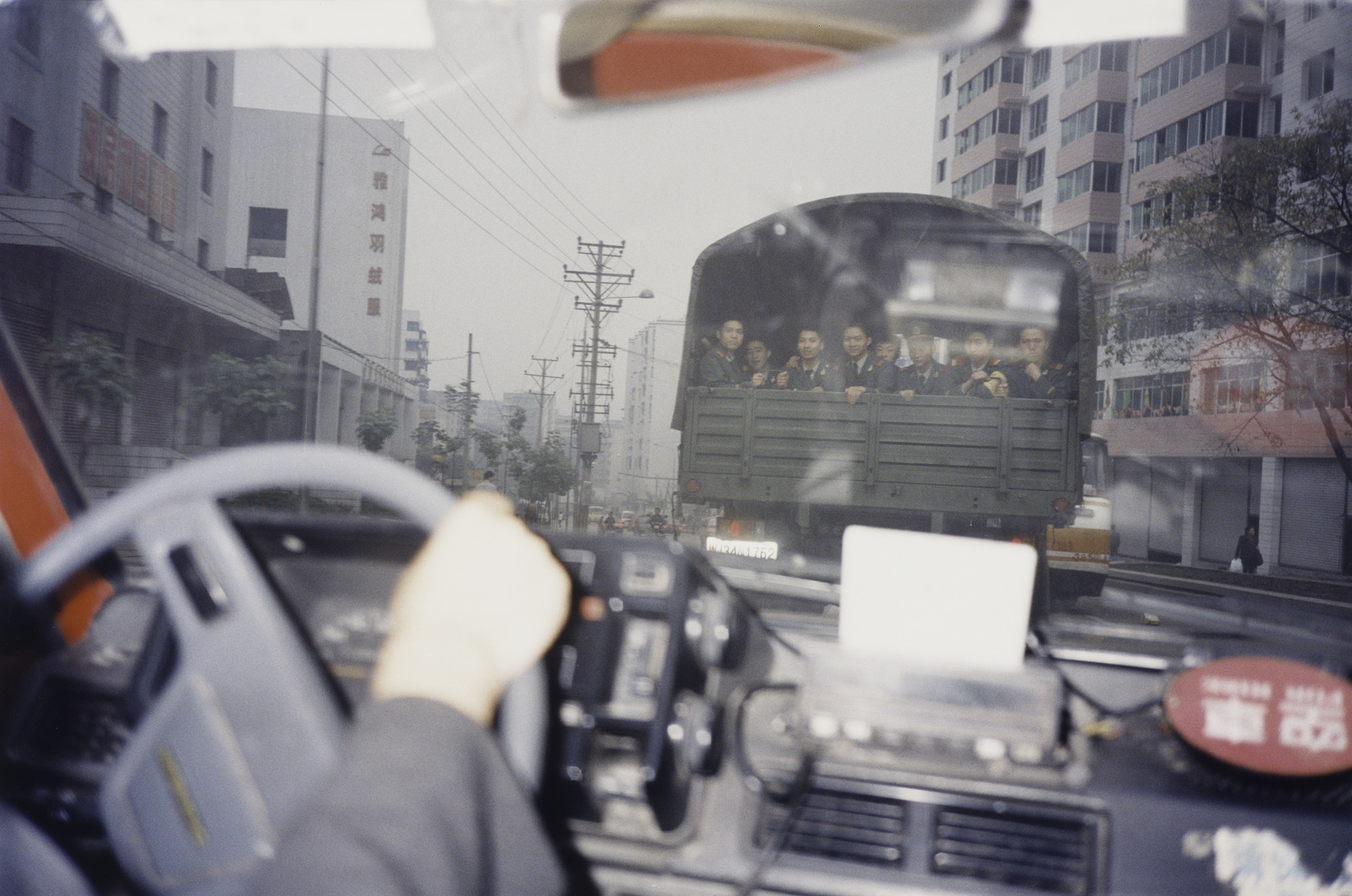 Bertien van Manen. From a Taxi, Shapingba, Chongqing. 2000