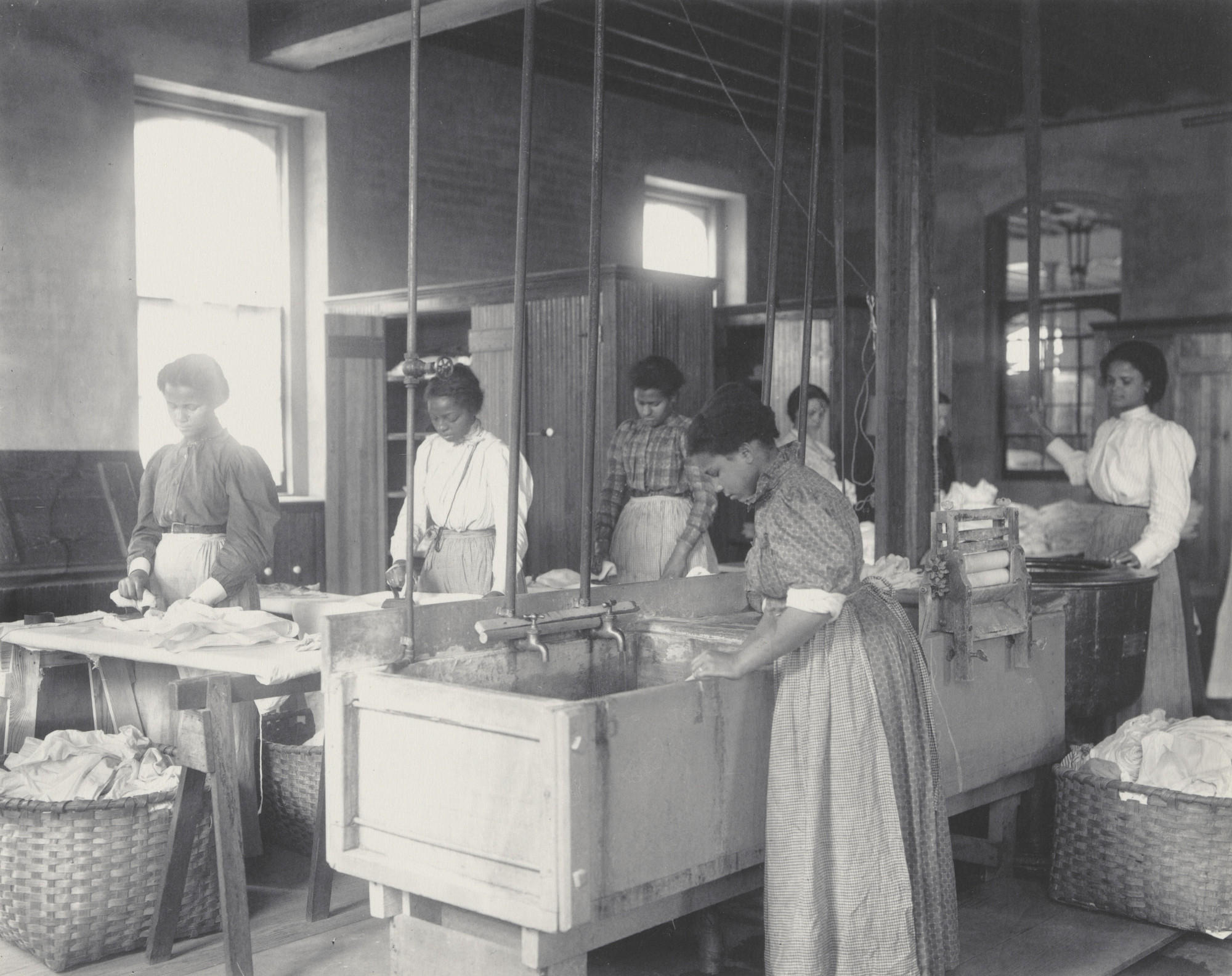 Frances Benjamin Johnston. A corner of the laundry