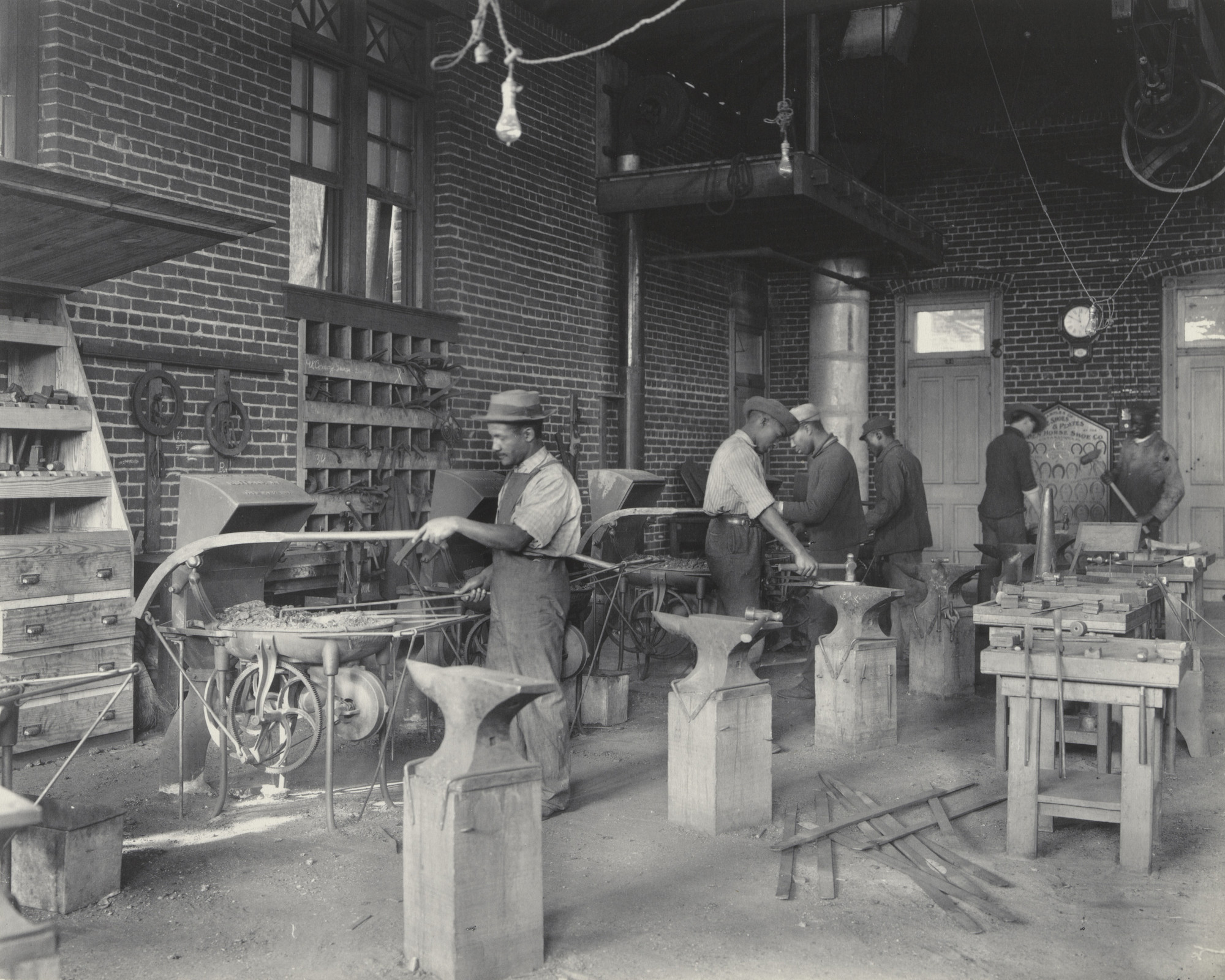Frances Benjamin Johnston. Trade School. A black-smith shop