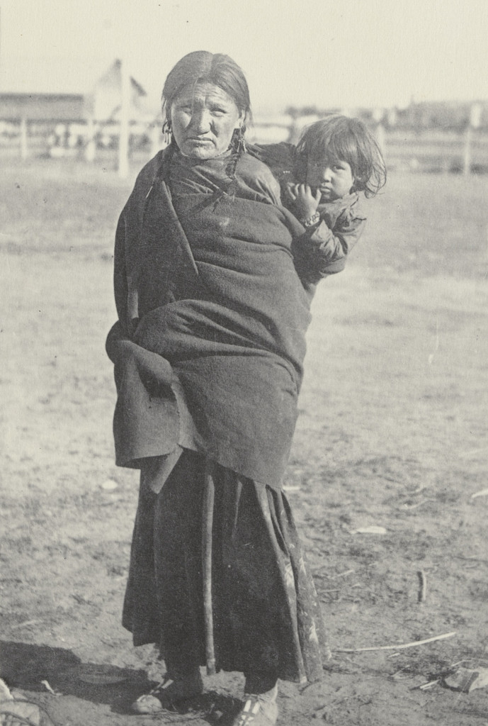 Without Education. Mrs. Black nail and child. Sioux