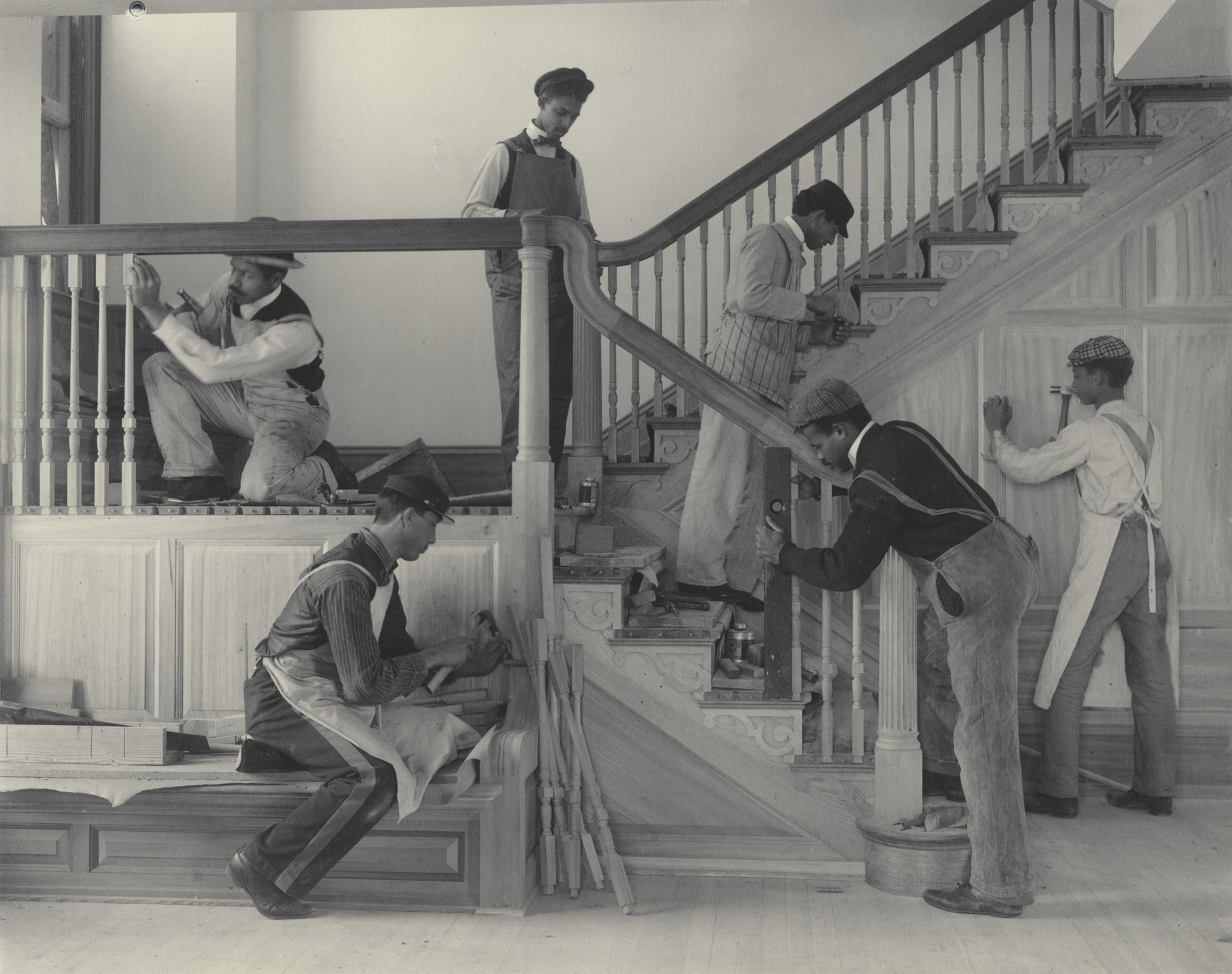 Frances Benjamin Johnston. Stairway of the Treasurer's Residence: Students at Work from the Hampton Album. 1899-1900