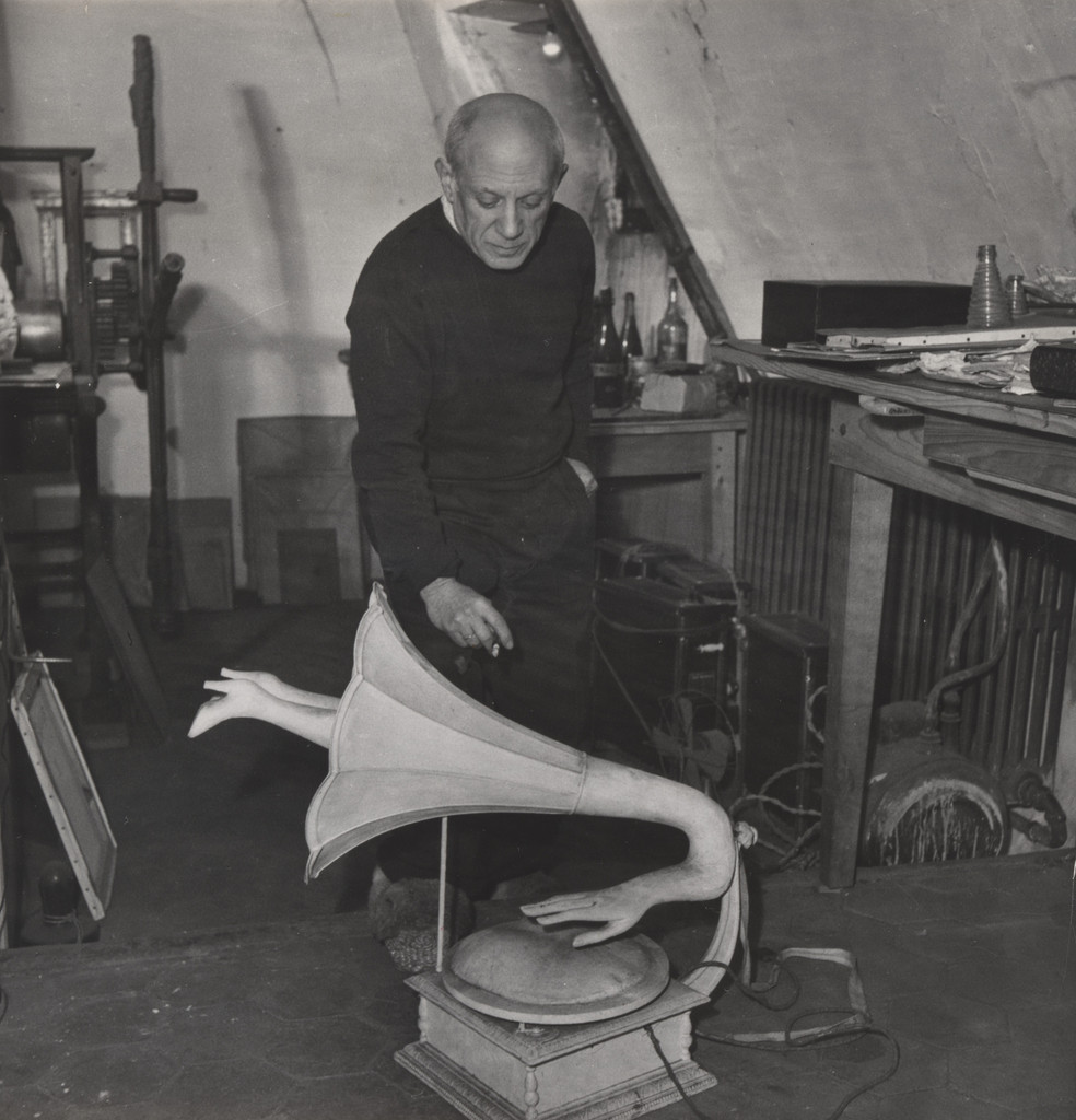 Untitled (Pablo Picasso with Oscar Dominguez's surrealist object Jamais, 1937)