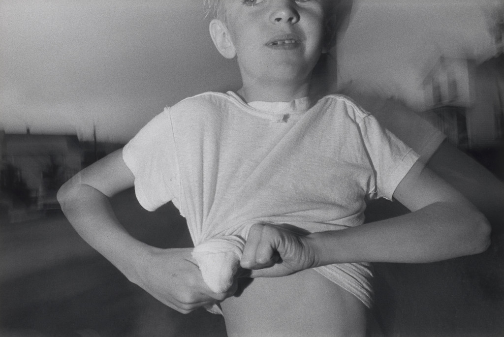 Boy Twisting Shirt