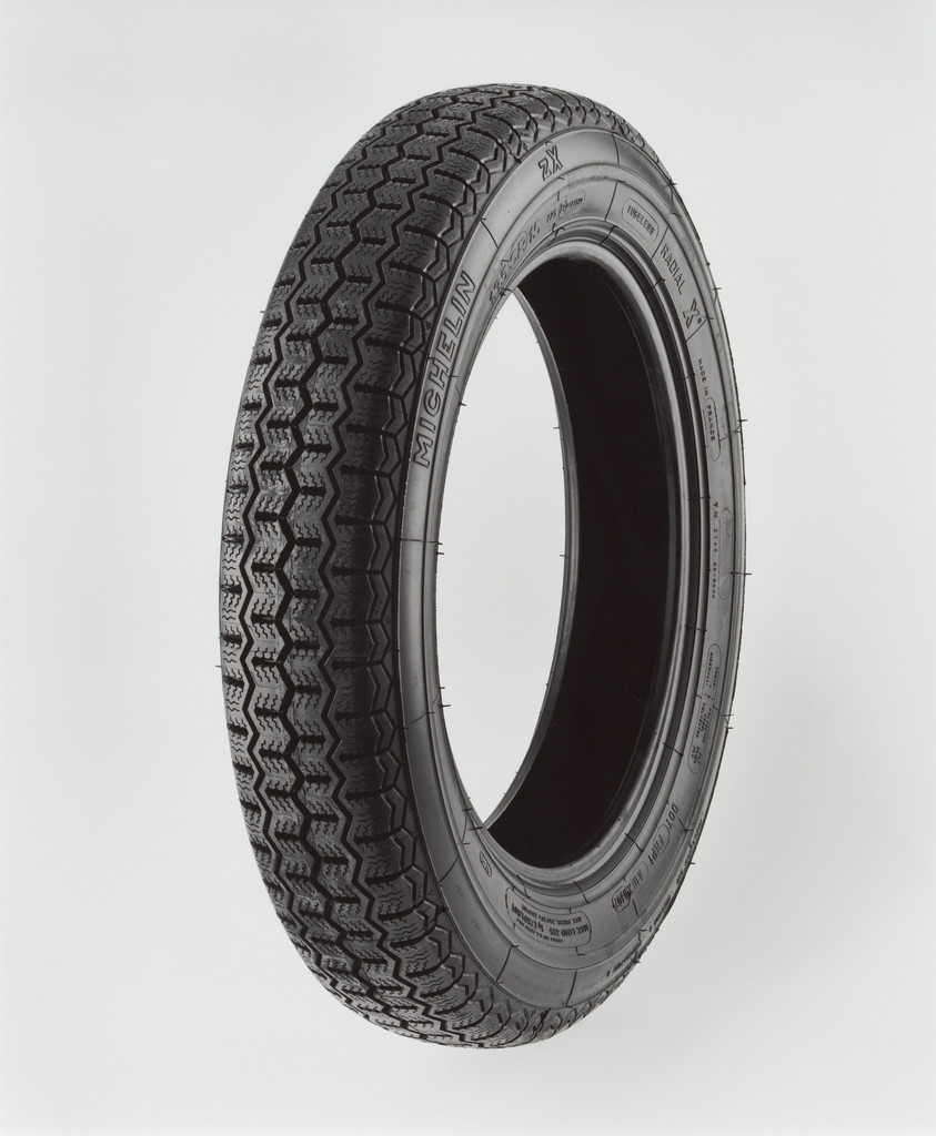 Clockwise from Manufacturer Name (Outer Ring), Michelin zX, Treadwear 200, Traction A, Temperature B, Clockwise from Tire Size (Inner Ring), 135 SR 15, 723 E2 0177523, Tubeless, Radial X, Made In France, TN 2148 20-2044, Tread: 1 Polyester Ply, + 2 Steel Plies, Sidewall: 1 Polyester Ply, DOT FH PI AID X0607, Canada and U.S. Codes Only, Max Load 355 Kg (780 Lbs), Max Press. 350 kPa (51 PSI), V-1, Photography by the Douglas M. Parker Studio, Glendale, California, December 27, 2007–January 2, 2008