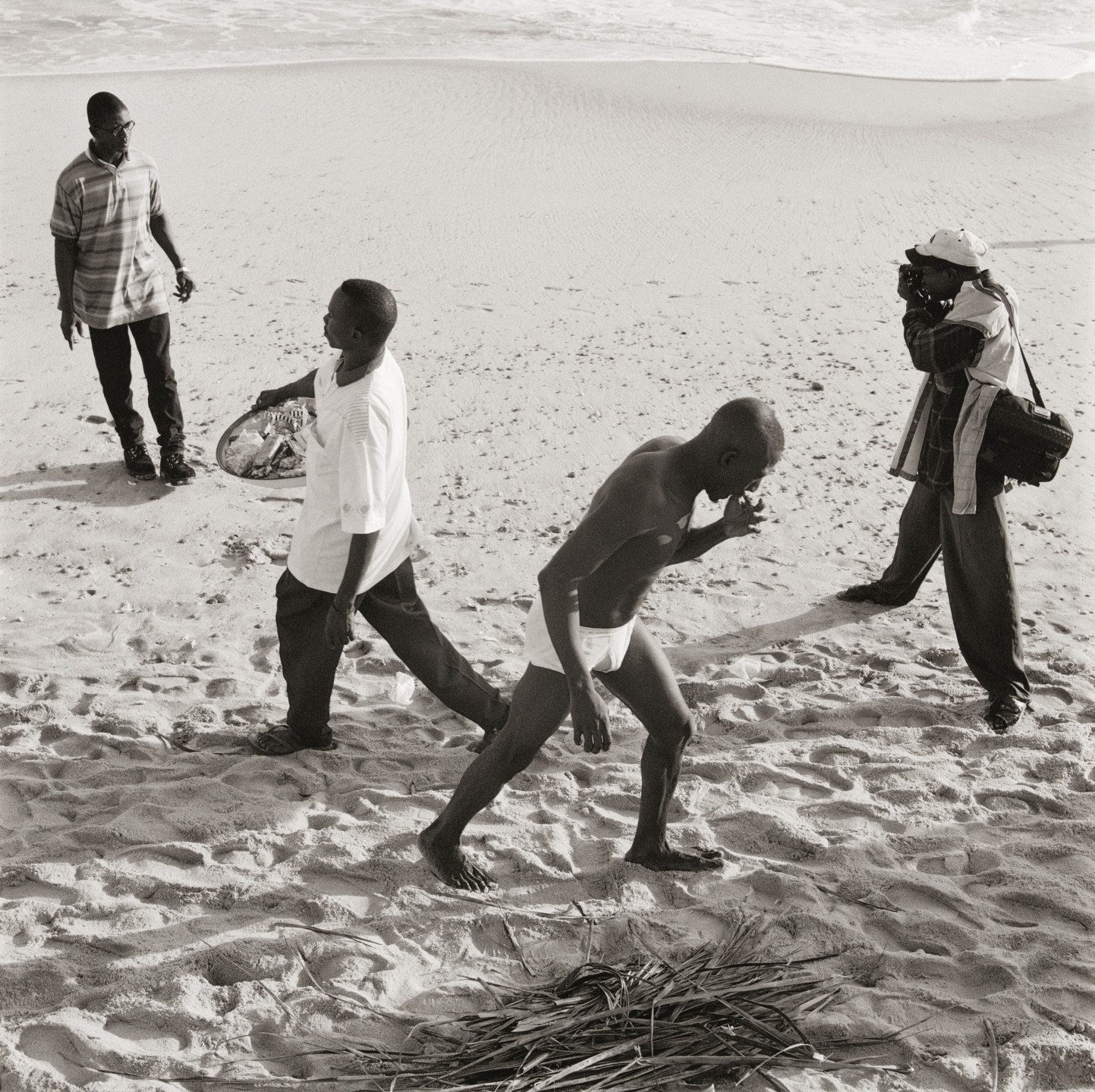 Akinbode Akinbiyi. Bar Beach, Victoria Island, Lagos from the series Sea Never Dry. 1999